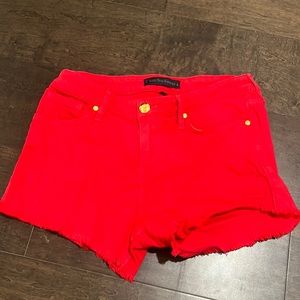 Lightly worn juicy couture mid-rise jean shorts